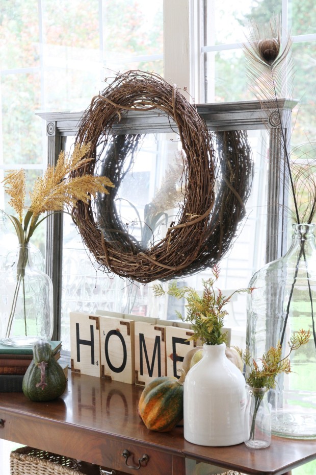 Twine wreath on mirror above dresser.