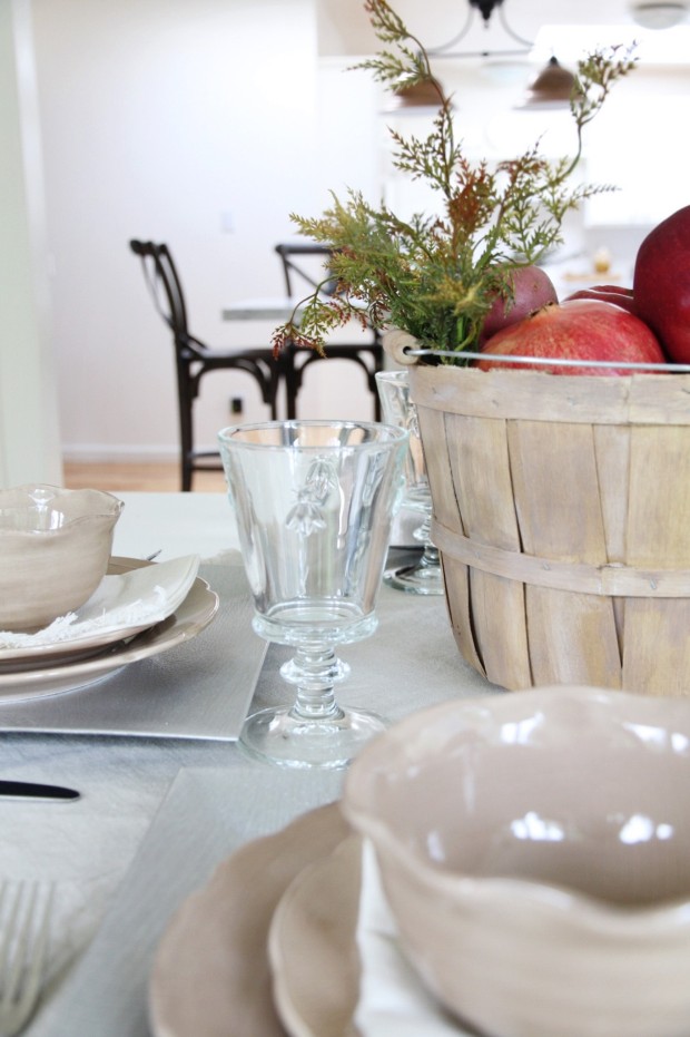 Clear glasses on the table setting.