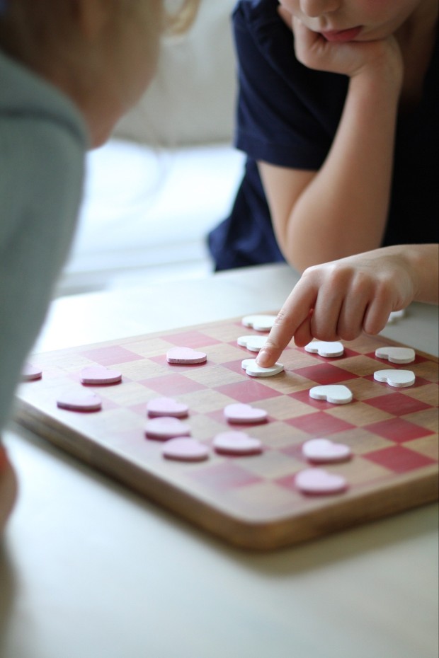 Children playing checkers.