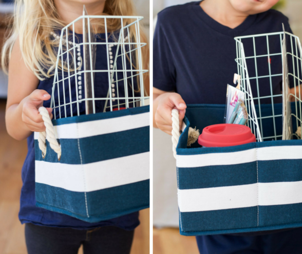 Two children each holding a teachers appreciation basket.