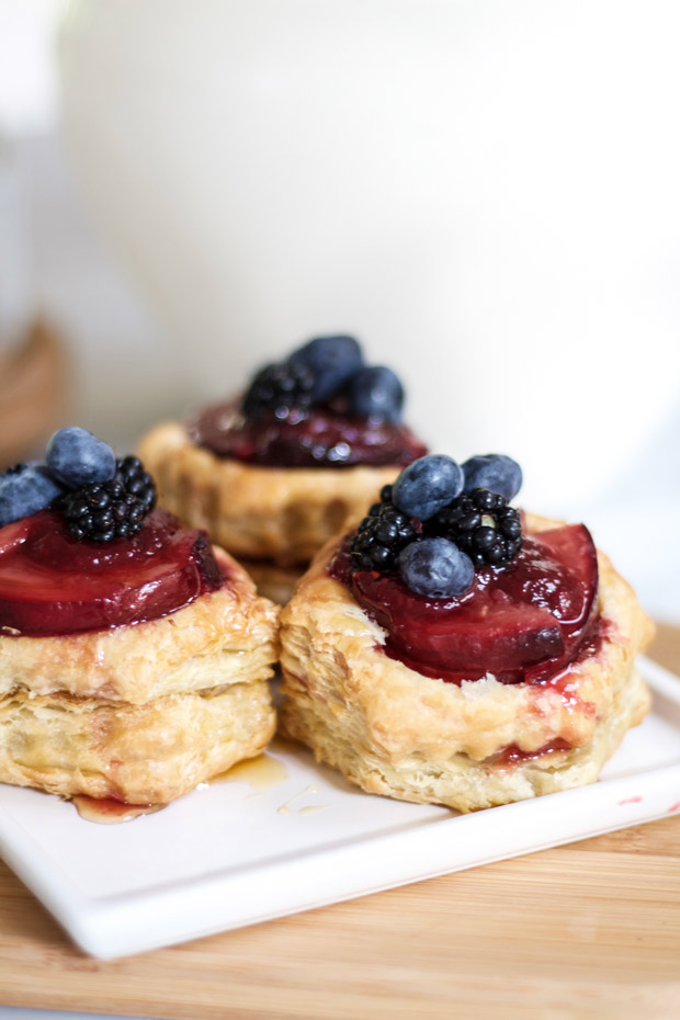 Raspberries, blueberries and plums on top of the puff pastry.