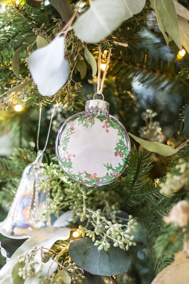 A clear Christmas ornament with the printable inside it.