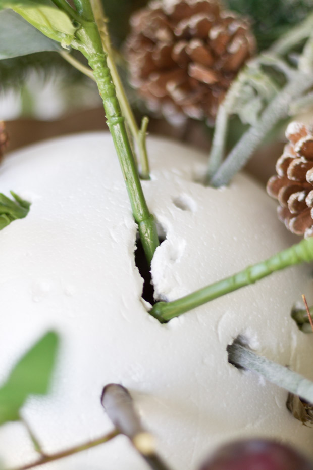 Arranging the stems in the styrofoam ball.