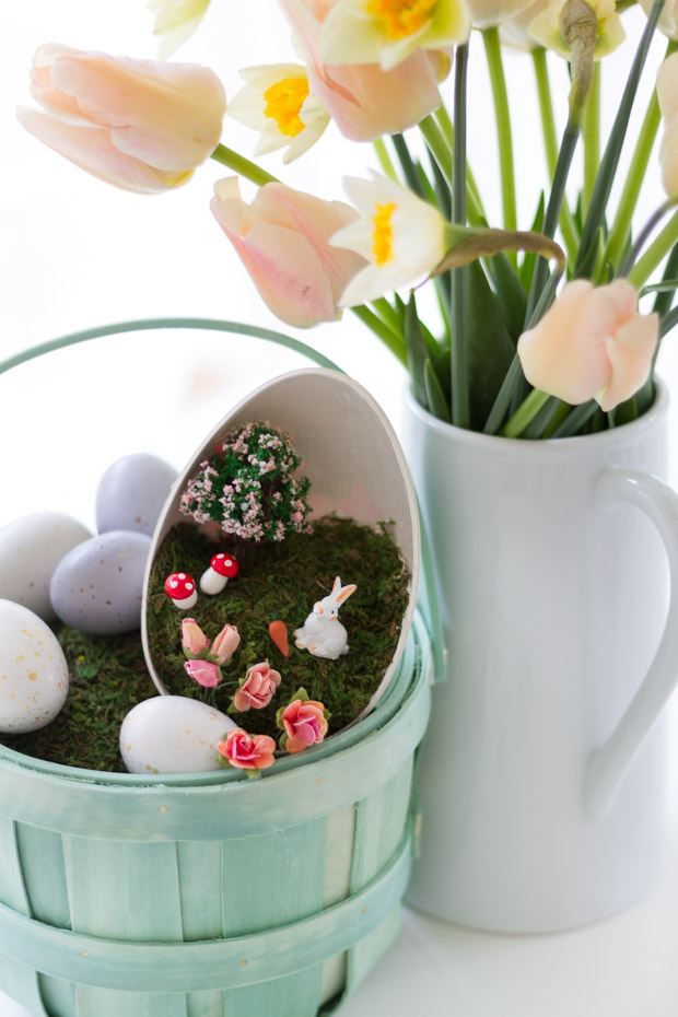 The flowers on the table beside the Easter Basket.