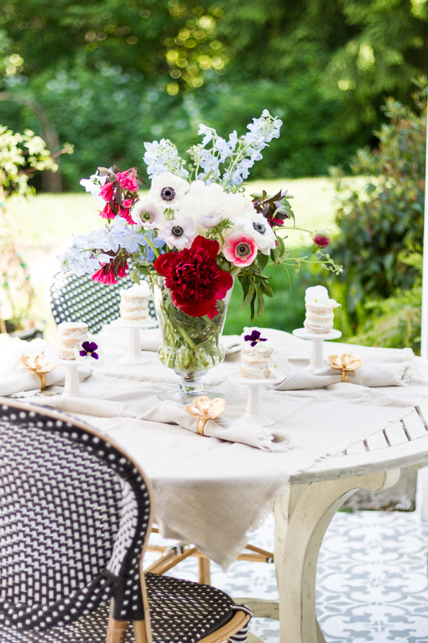 Outdoor table decorated for a garden party.