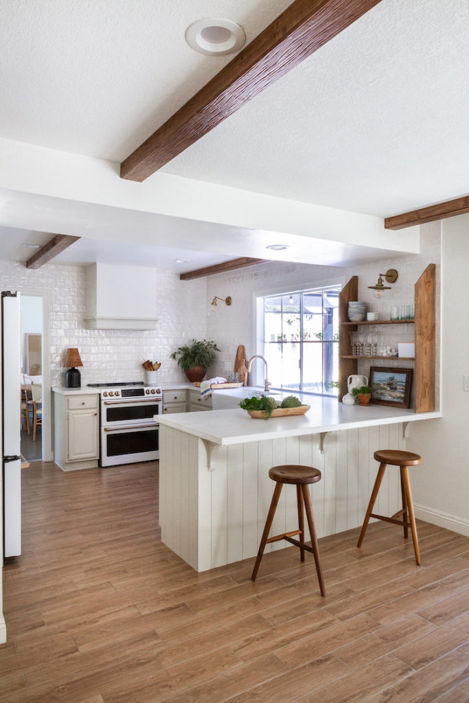 Our Updated Kitchen Peninsula with Coastal Counter Stools