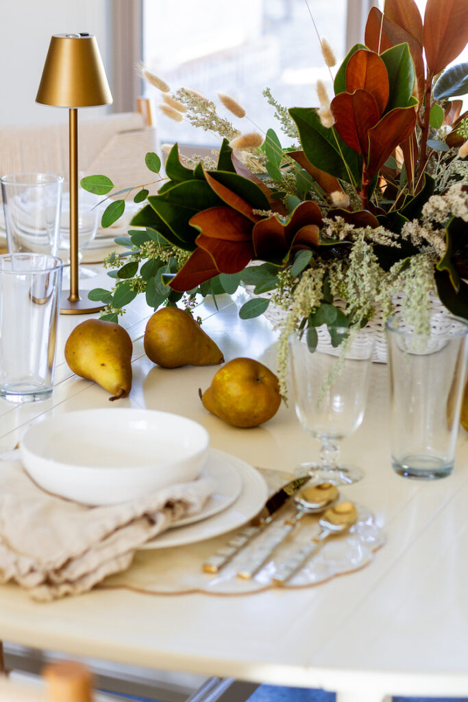 Thanksgiving Table Setting With Magnolia Leaf Centerpiece
